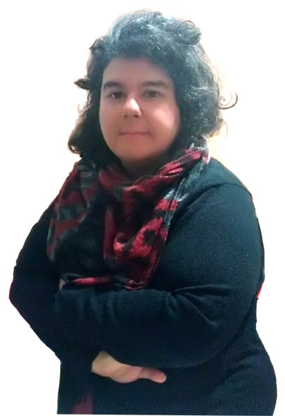 Luana Spinetti posing with arms crossed; bust image. Taken January 2020
